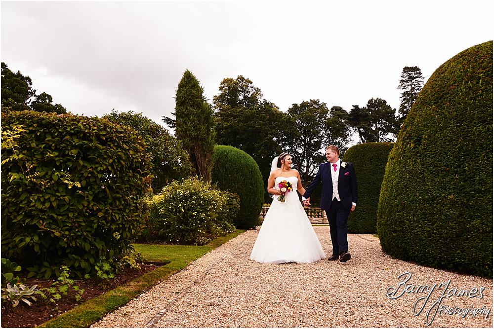 Creative natural wedding portraits around the stunning grounds and gardens at Chateau Impney at Droitwich by Wedding Photographer Barry James