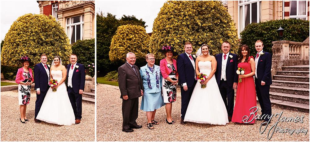 Relaxed family photographs during the wedding reception at Chateau Impney at Droitwich by Wedding Photographer Barry James