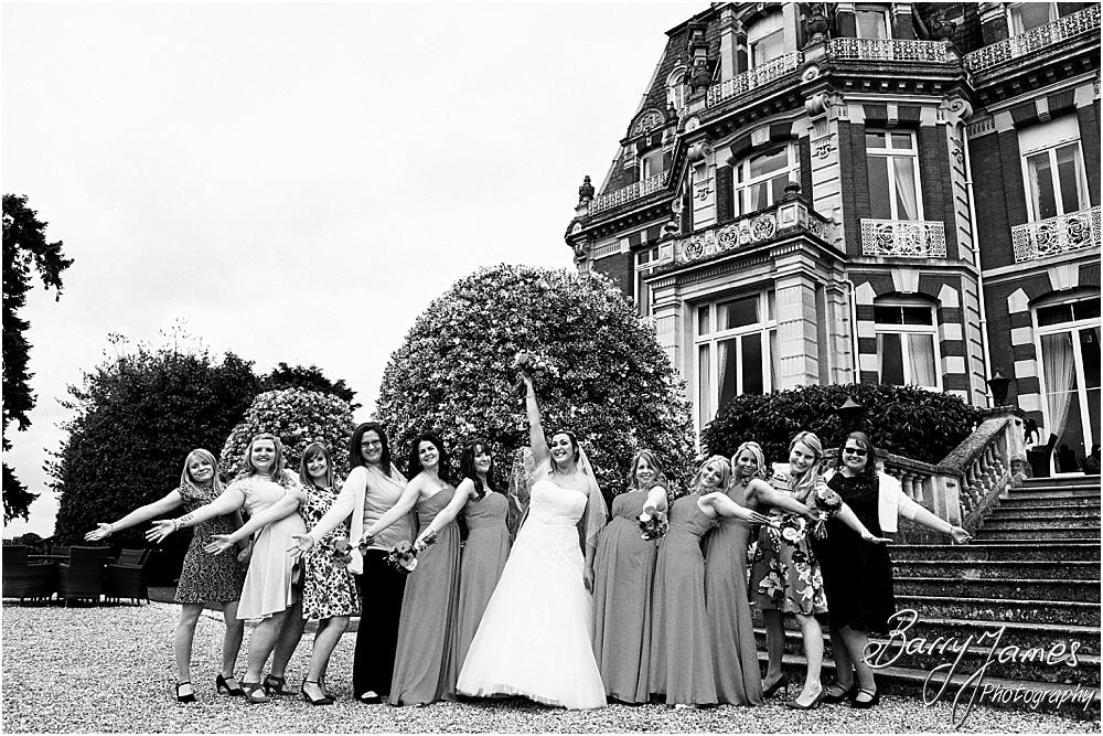 Relaxed family photographs during the wedding reception at Chateau Impney at Droitwich by Wedding Photographer Barry James