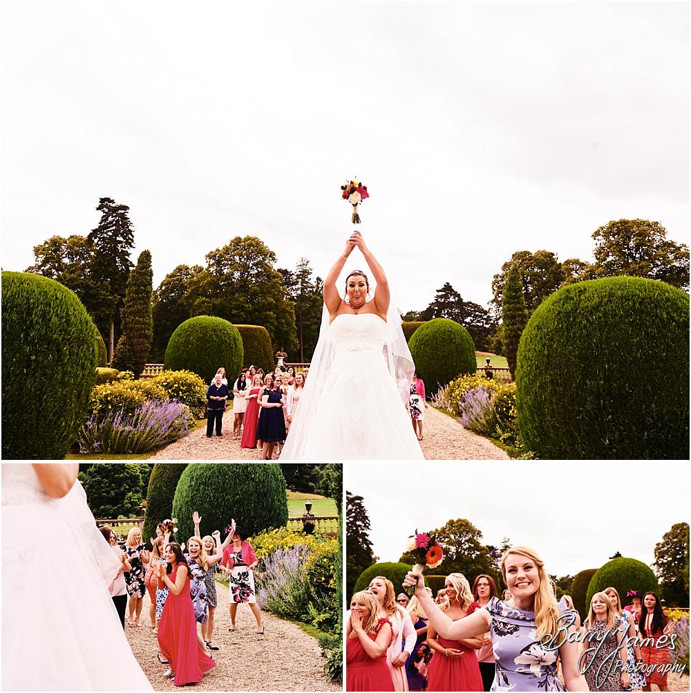 Bouquet toss fun at Chateau Impney at Droitwich by Wedding Photographer Barry James