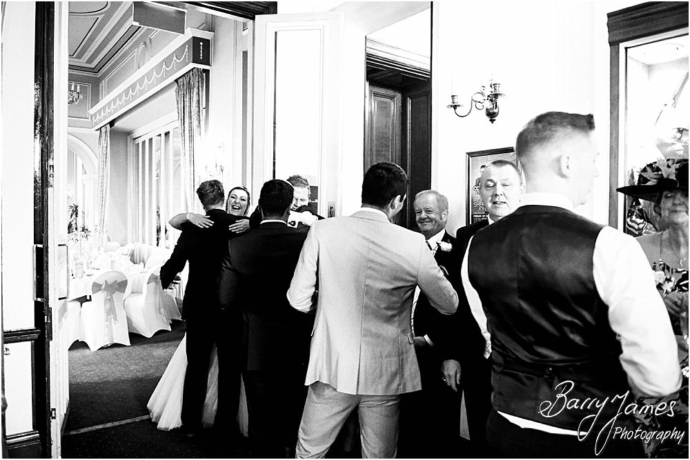 Creative candid photographs of the wonderful speeches at Chateau Impney at Droitwich by Wedding Photographer Barry James