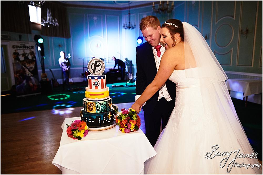 Cake cutting fun at Chateau Impney at Droitwich by Wedding Photographer Barry James