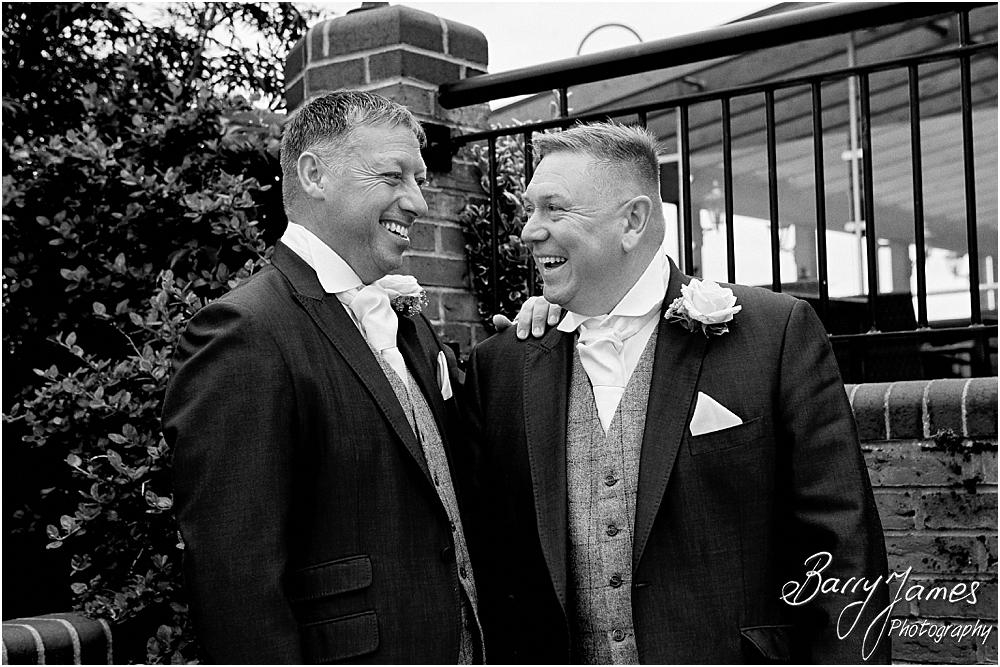 Capturing relaxed photographs of the Groom at The Crows Nest at Barton Marina by Wedding Photographer Barry James