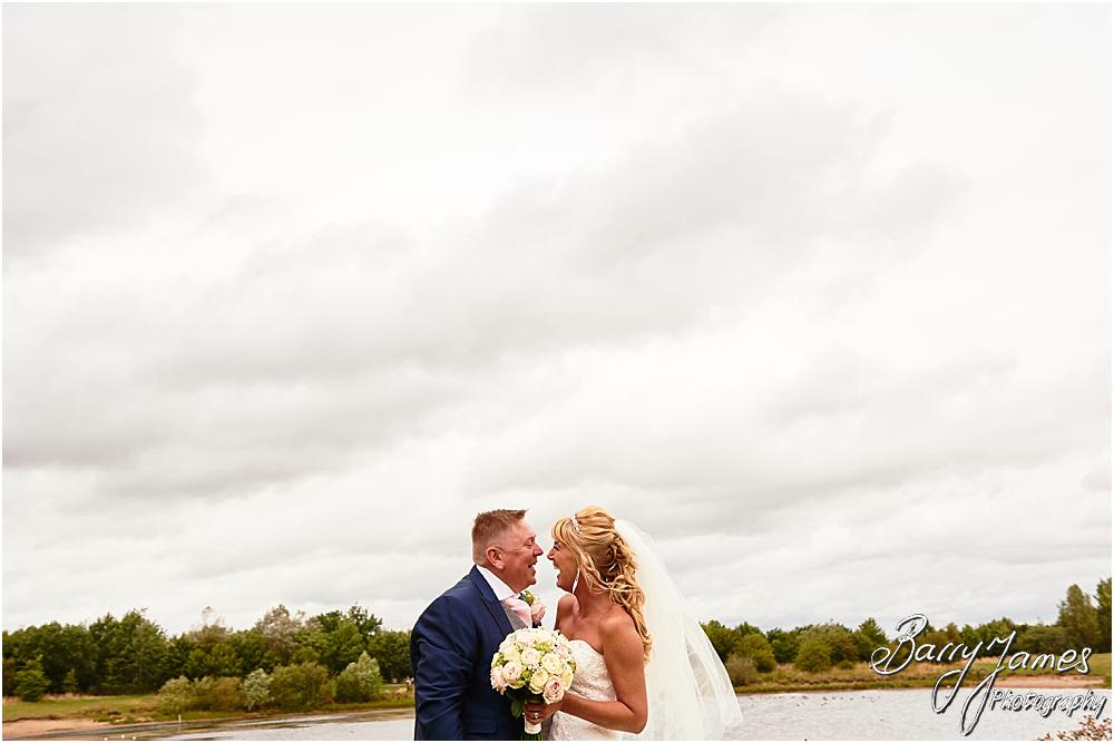 Utilising the stunning setting at The Crows Nest at Barton Marina for creative wedding portraits with Wedding Photographer Barry James