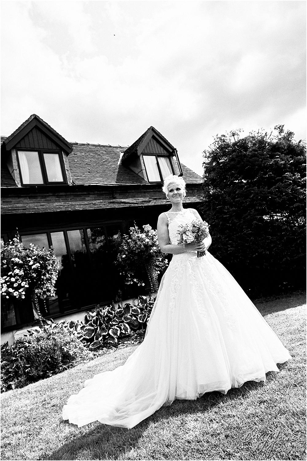 Creative contemporary photographs of the bride and bridal party at Oak Farm Hotel in Cannock by Stafford Wedding Photographer Barry James