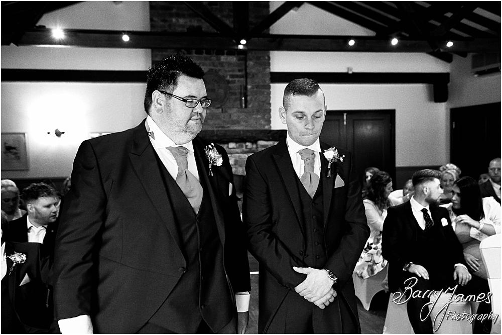 Capturing the beauty of the wedding ceremony with candid photographs unobtrusively telling each moment at Oak Farm Hotel in Cannock by Cannock Wedding Photographer Barry James