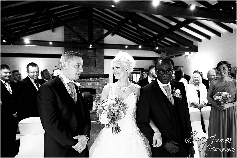 Capturing the beauty of the wedding ceremony with candid photographs unobtrusively telling each moment at Oak Farm Hotel in Cannock by Cannock Wedding Photographer Barry James