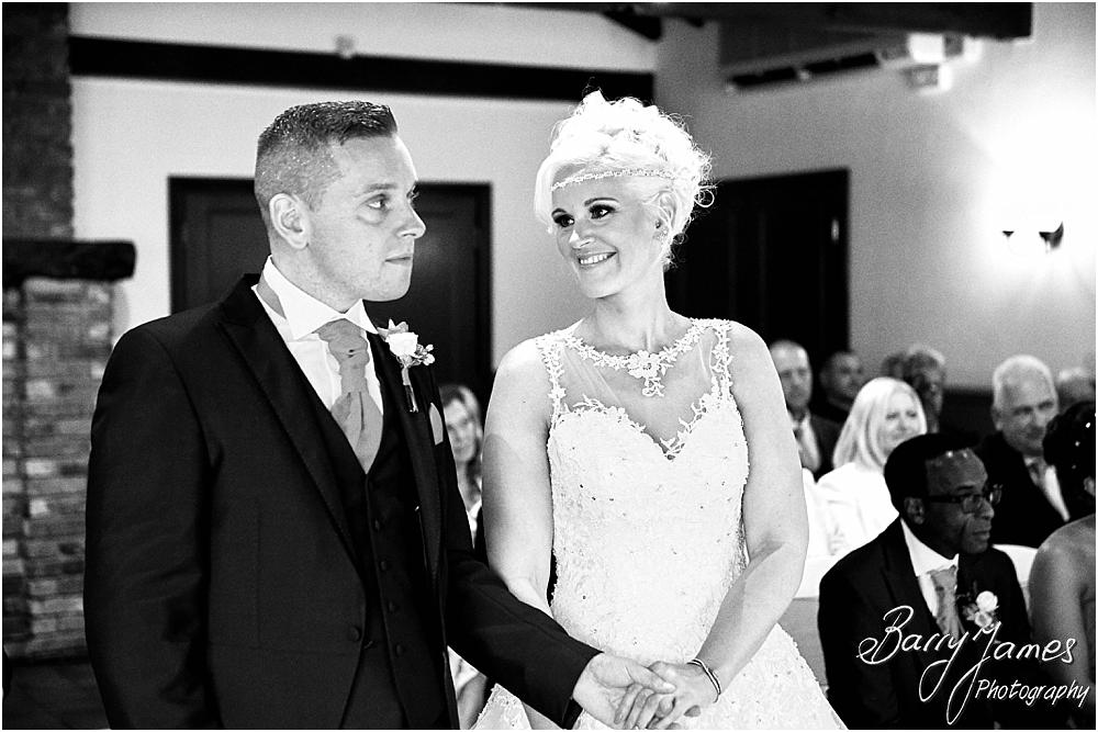 Capturing the beauty of the wedding ceremony with candid photographs unobtrusively telling each moment at Oak Farm Hotel in Cannock by Cannock Wedding Photographer Barry James
