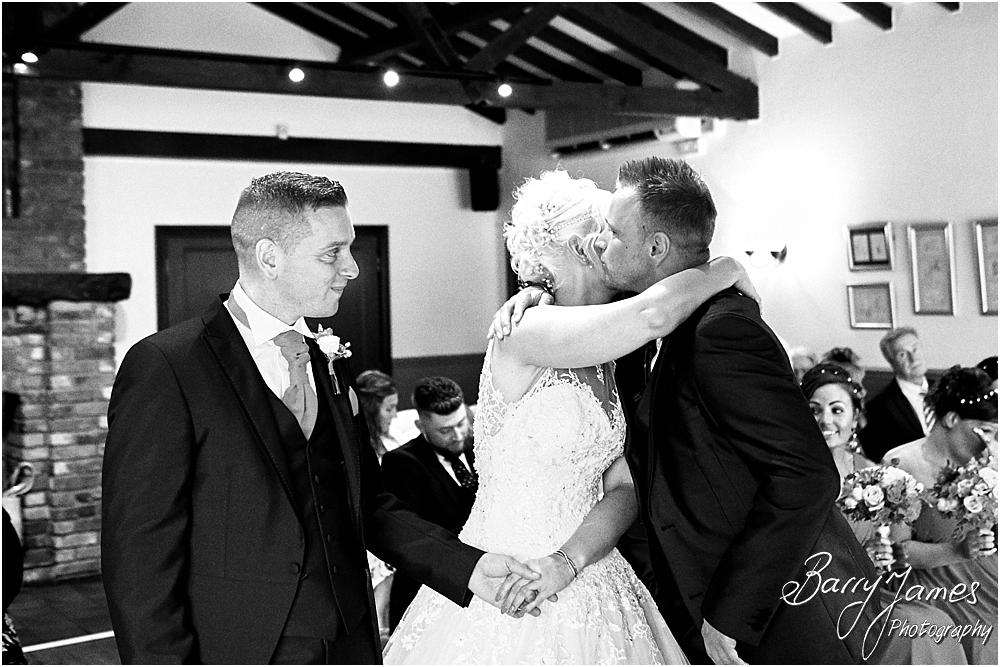 Capturing the beauty of the wedding ceremony with candid photographs unobtrusively telling each moment at Oak Farm Hotel in Cannock by Cannock Wedding Photographer Barry James