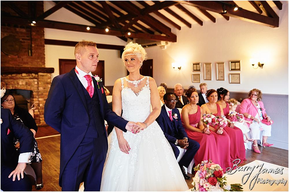 Capturing the beauty of the wedding ceremony with candid photographs unobtrusively telling each moment at Oak Farm Hotel in Cannock by Cannock Wedding Photographer Barry James