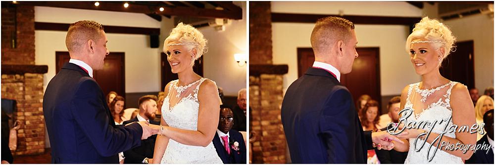 Capturing the beauty of the wedding ceremony with candid photographs unobtrusively telling each moment at Oak Farm Hotel in Cannock by Cannock Wedding Photographer Barry James