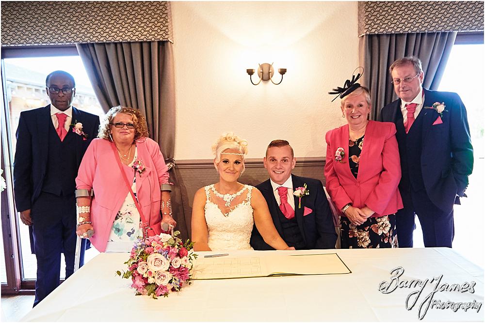 Capturing the beauty of the wedding ceremony with candid photographs unobtrusively telling each moment at Oak Farm Hotel in Cannock by Cannock Wedding Photographer Barry James