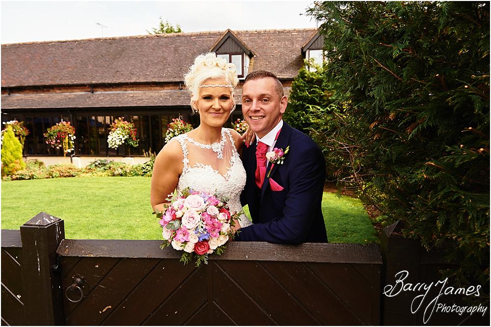 Creative relaxed portraits in the stunning front gardens at Oak Farm Hotel in Cannock by Cannock Wedding Photographer Barry James