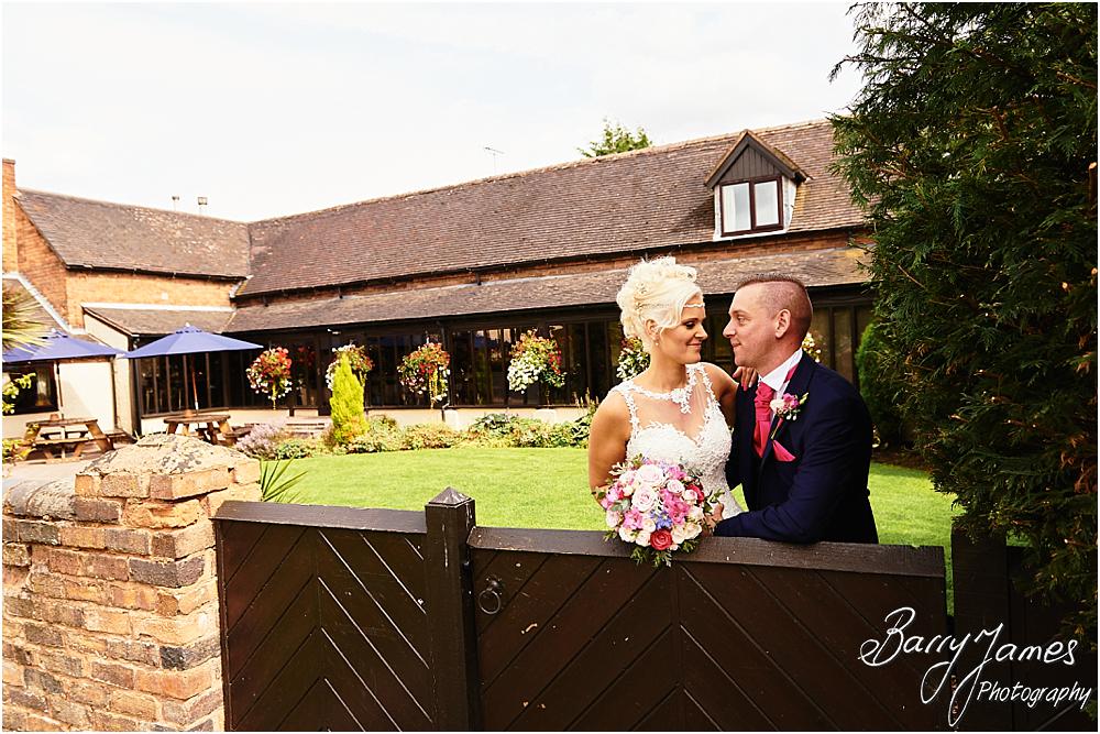 Creative relaxed portraits in the stunning front gardens at Oak Farm Hotel in Cannock by Cannock Wedding Photographer Barry James