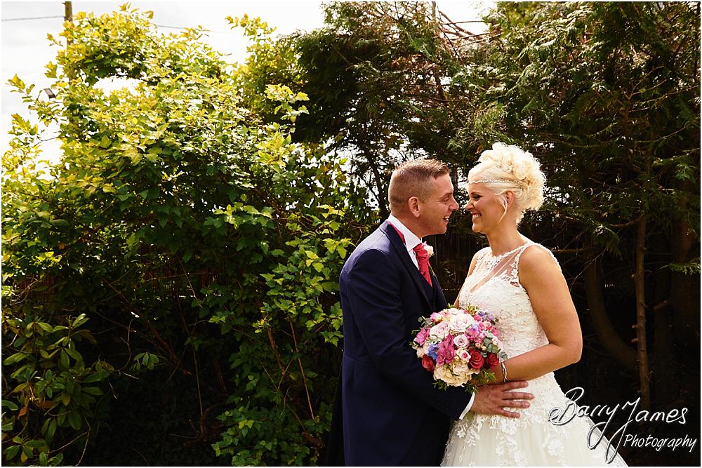 Creative relaxed portraits in the stunning front gardens at Oak Farm Hotel in Cannock by Cannock Wedding Photographer Barry James