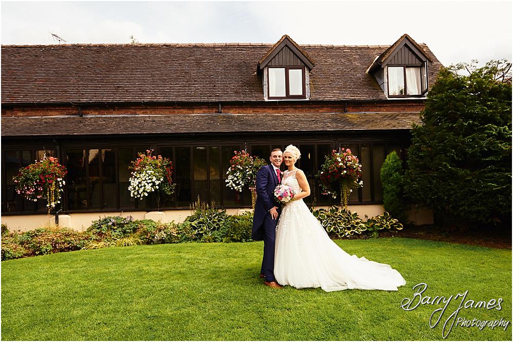 Creative relaxed portraits in the stunning front gardens at Oak Farm Hotel in Cannock by Cannock Wedding Photographer Barry James