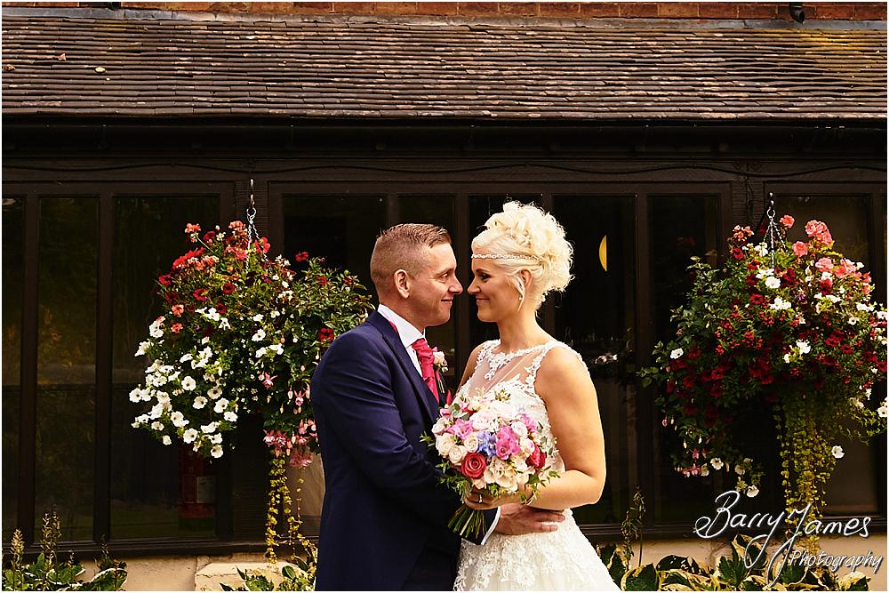 Creative relaxed portraits in the stunning front gardens at Oak Farm Hotel in Cannock by Cannock Wedding Photographer Barry James