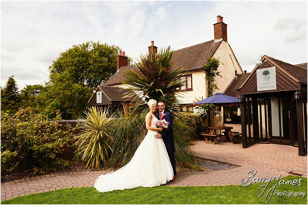 Creative relaxed portraits in the stunning front gardens at Oak Farm Hotel in Cannock by Cannock Wedding Photographer Barry James