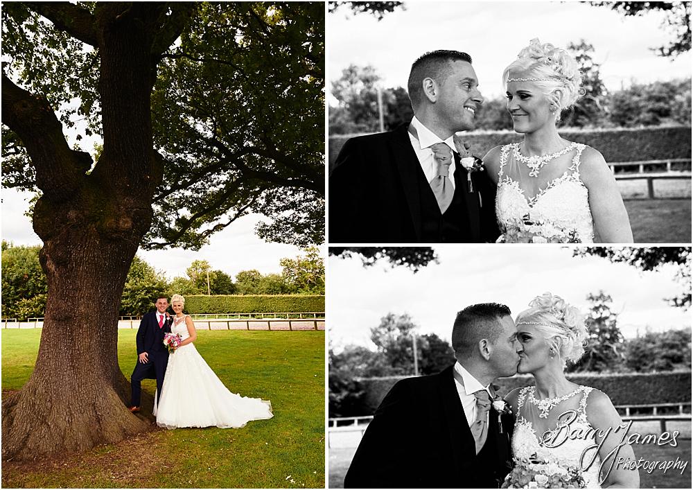 Utilising the countryside setting of the rear gardens at Oak Farm Hotel in Cannock by Cannock Wedding Photographer Barry James
