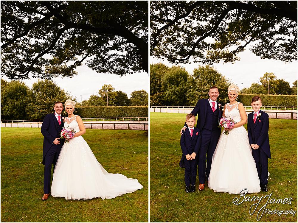 Relaxed family photographs in the gardens at Oak Farm Hotel in Cannock by Cannock Wedding Photographer Barry James