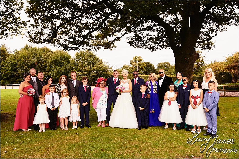 Relaxed family photographs in the gardens at Oak Farm Hotel in Cannock by Cannock Wedding Photographer Barry James