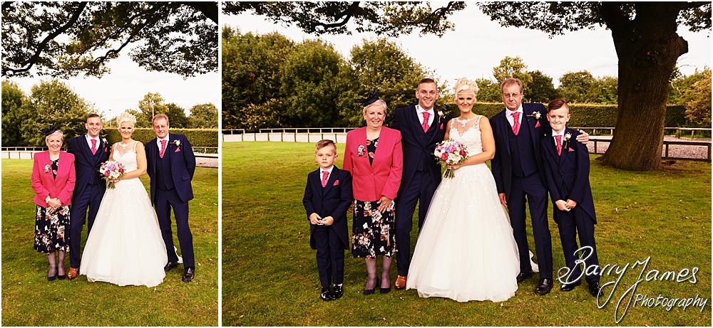 Relaxed family photographs in the gardens at Oak Farm Hotel in Cannock by Cannock Wedding Photographer Barry James