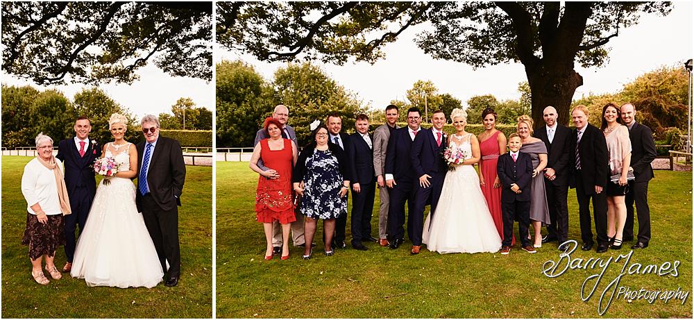 Relaxed family photographs in the gardens at Oak Farm Hotel in Cannock by Cannock Wedding Photographer Barry James