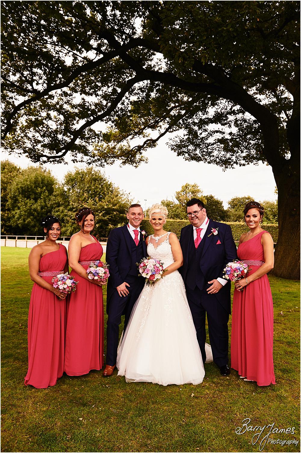 Relaxed family photographs in the gardens at Oak Farm Hotel in Cannock by Cannock Wedding Photographer Barry James