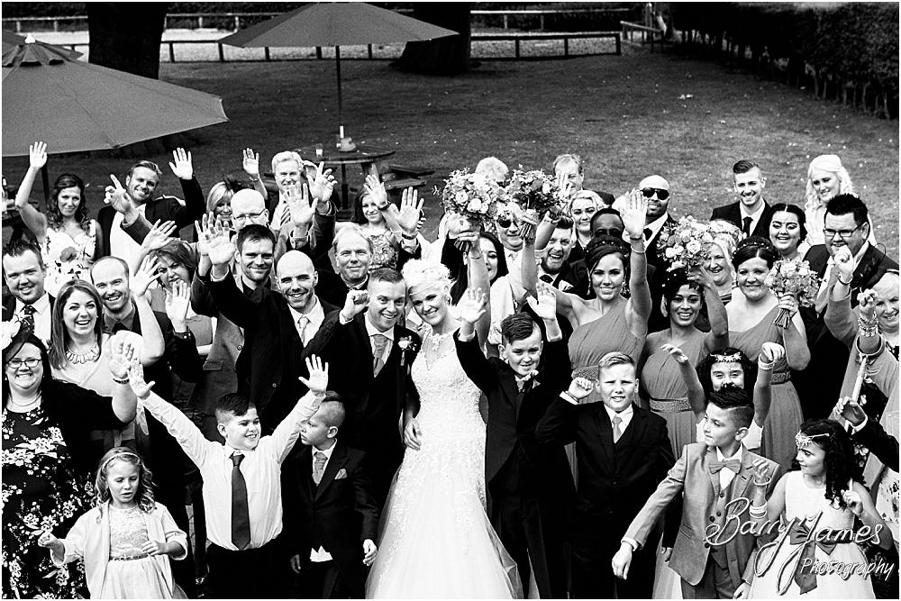 Relaxed family photographs in the gardens at Oak Farm Hotel in Cannock by Cannock Wedding Photographer Barry James