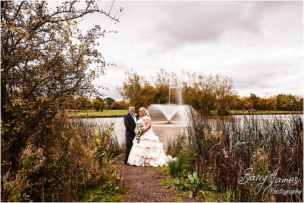 Elegant and relaxed portraits of the bride and groom around the lakeside gardens at Calderfields in Walsall by Walsall Wedding Photographer Barry James
