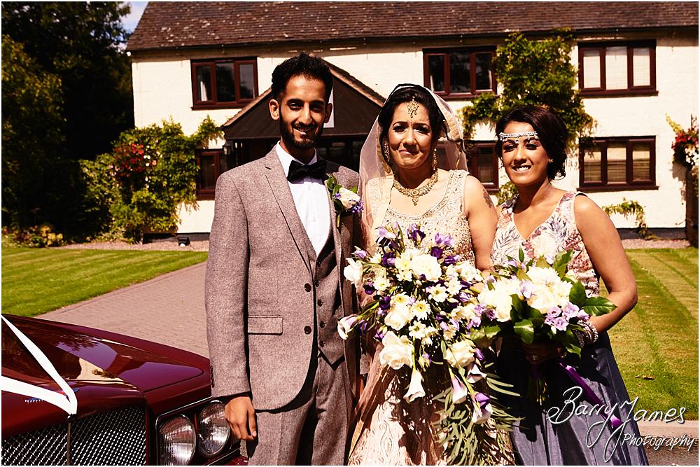 Creative photographs of the brides arrival for the beautiful wedding at Oak Farm Hotel in Cannock by Cannock Wedding Photographer Barry James