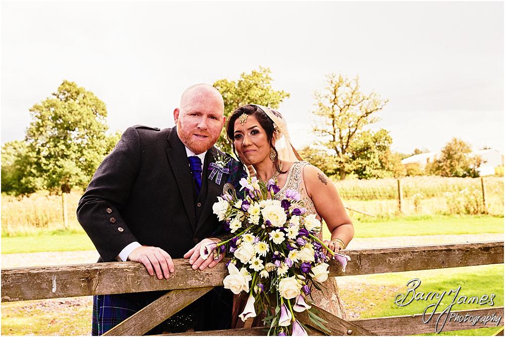 Beautiful portraits of the Bride and Groom in the countryside rear gardens of Oak Farm Hotel in Cannock by Cannock Wedding Photographer Barry James