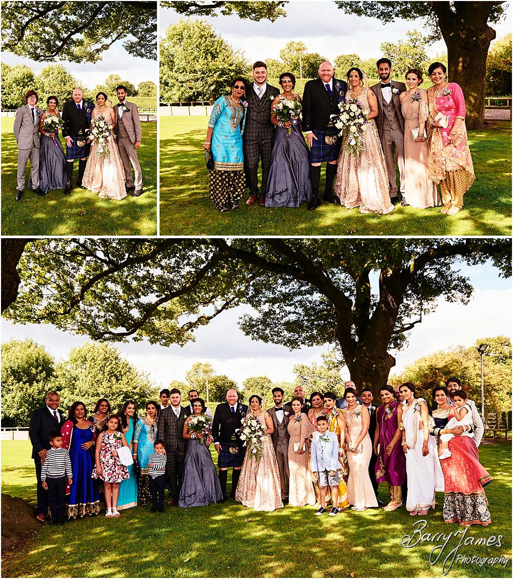 Relaxed natural family photographs during the drinks reception at Oak Farm Hotel in Cannock by Cannock Wedding Photographer Barry James