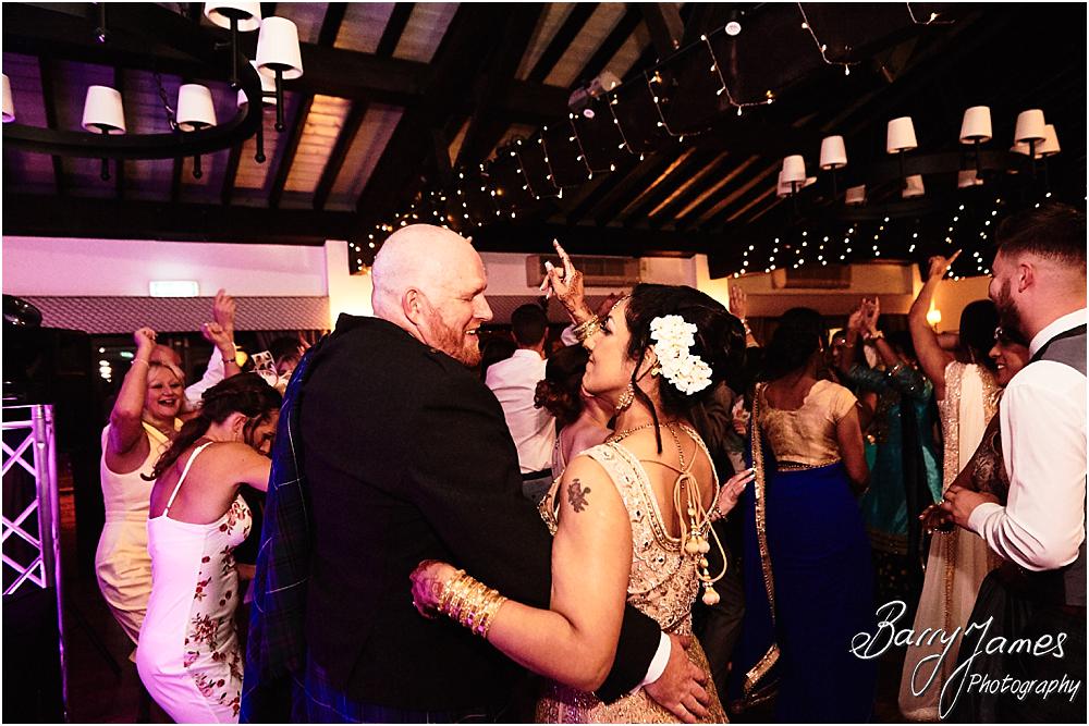 Creative photographs showing the life and wonderful feeling of the wedding reception as the party got truly underway at Oak Farm Hotel in Cannock by Cannock Wedding Photographer Barry James