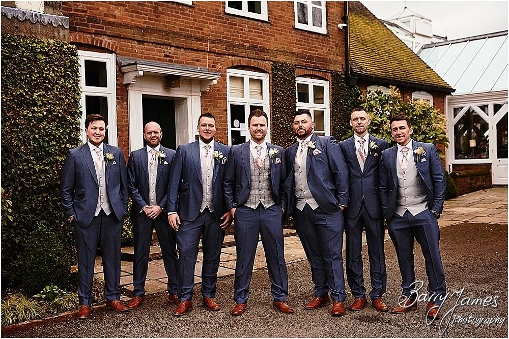 Creative contemporary portraits of the groom and groomsmen at The Moat House in Acton Trussell by Staffordhire Wedding Photographers Barry James