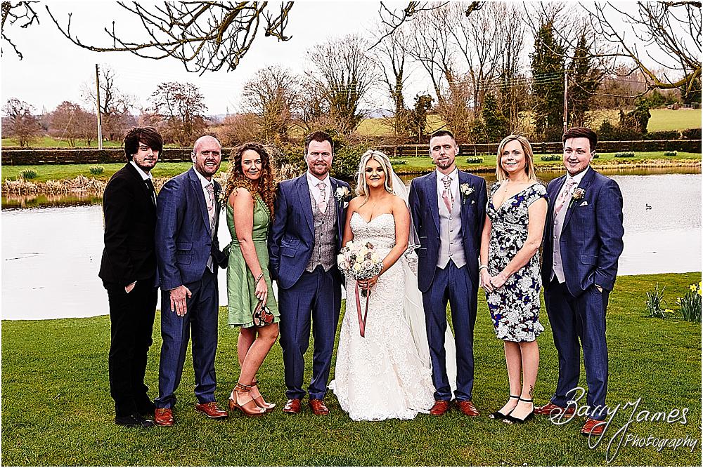 Creative contemporary portraits of the family during the wedding reception at The Moat House in Acton Trussell by Staffordhire Wedding Photographers Barry James