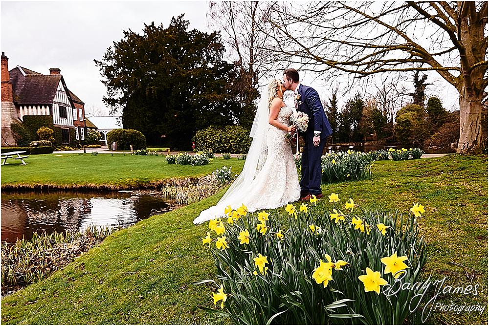Stunning portraits of the bride and groom around the stunning grounds at The Moat House in Acton Trussell by Staffordhire Wedding Photographers Barry James