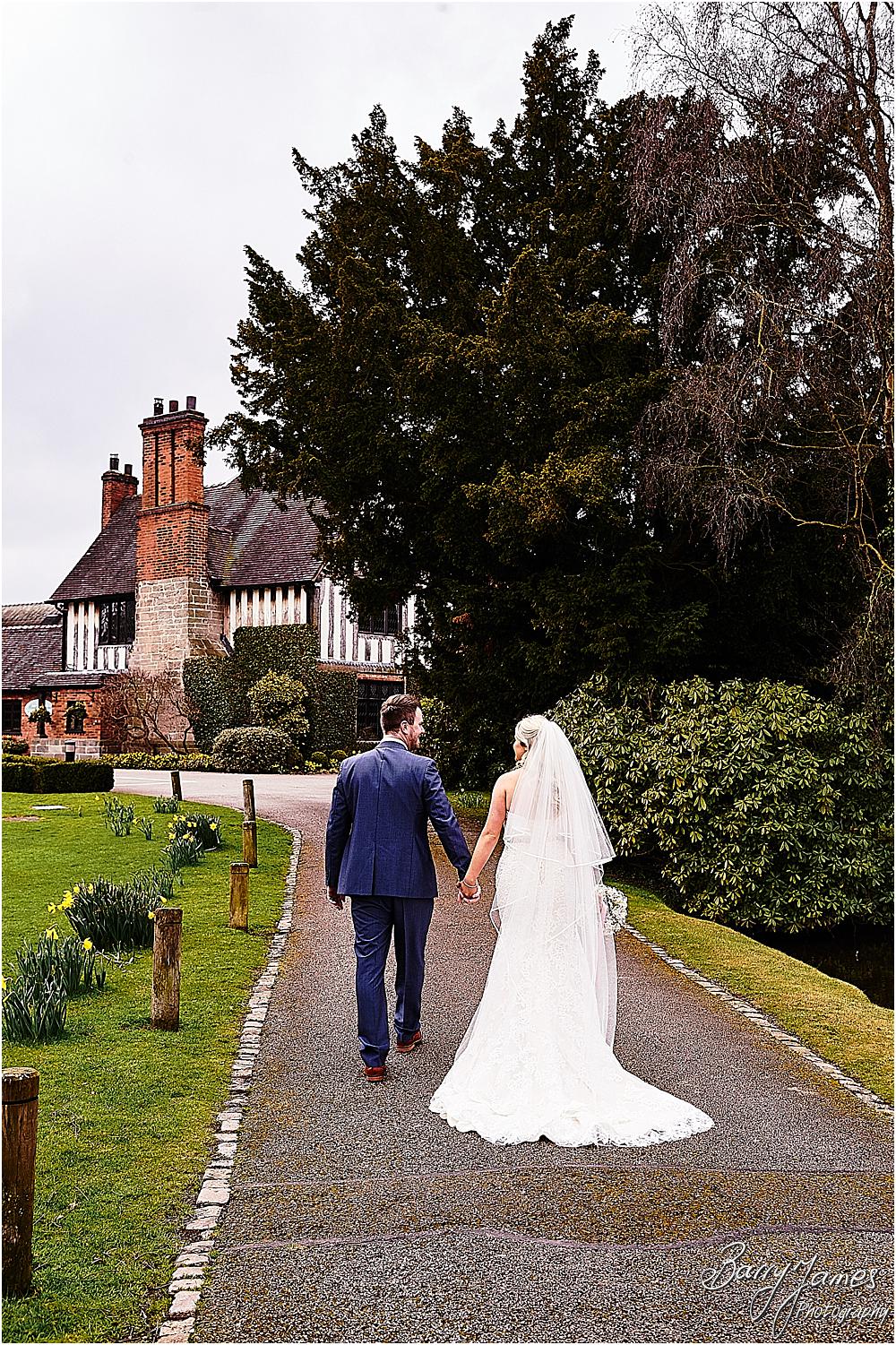 Stunning portraits of the bride and groom around the stunning grounds at The Moat House in Acton Trussell by Staffordhire Wedding Photographers Barry James