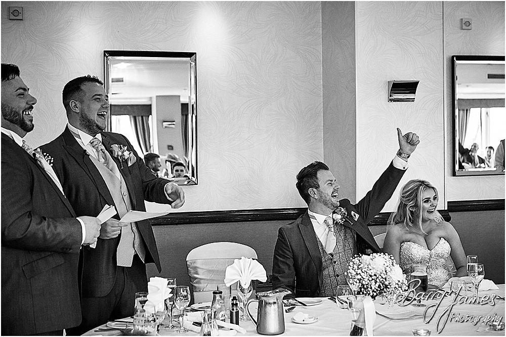 Candid photographs capturing the wedding speeches and the fabulous reactions from the guests at The Moat House in Acton Trussell by Staffordhire Wedding Photographers Barry James