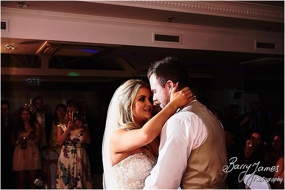 Creative timeless photos of the first dance as the evening reception gets underway to the DJ at The Moat House in Acton Trussell by Staffordhire Wedding Photographers Barry James
